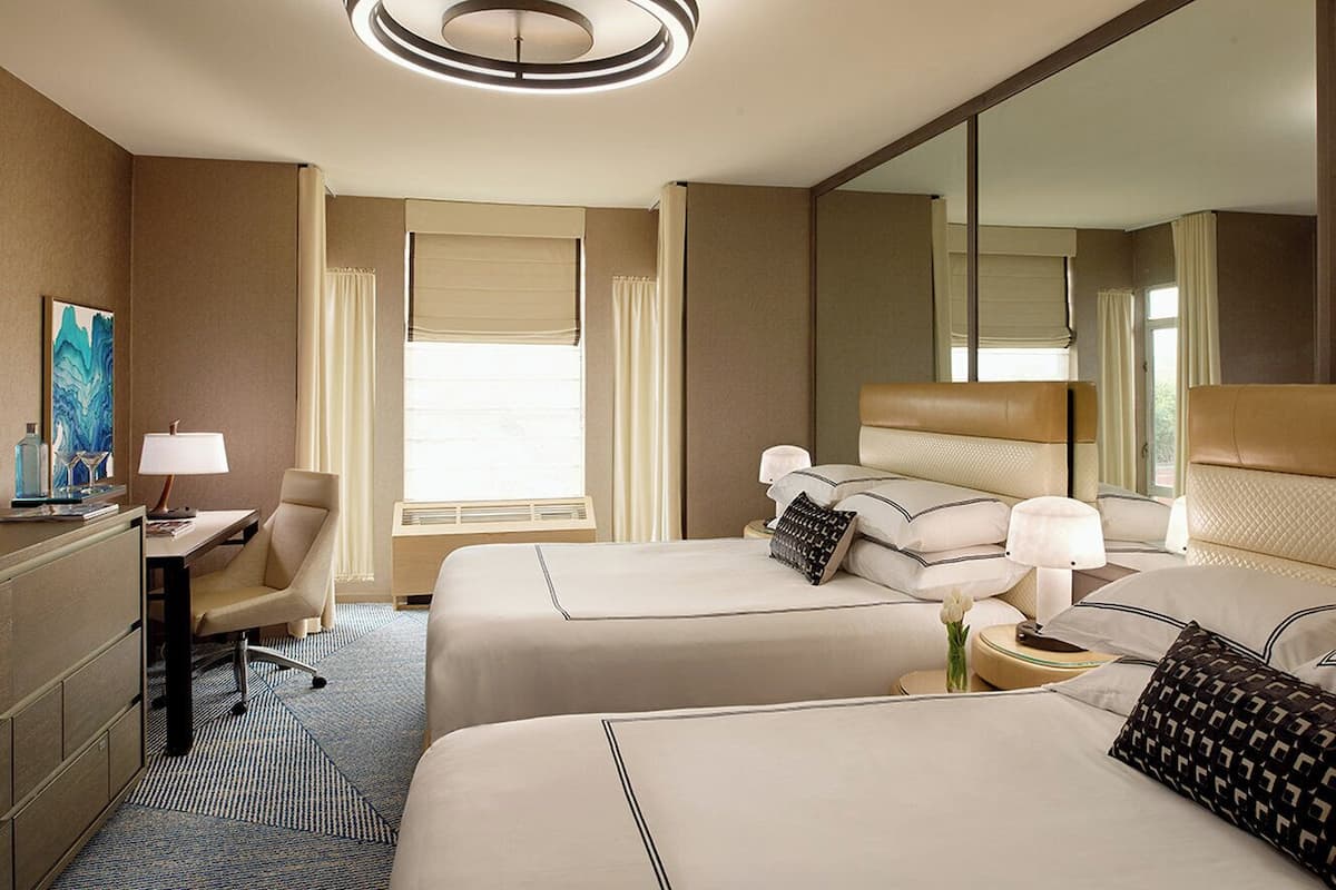 deluxe room, 2 queen beds (e1) | premium bedding, minibar, in-room safe, individually decorated