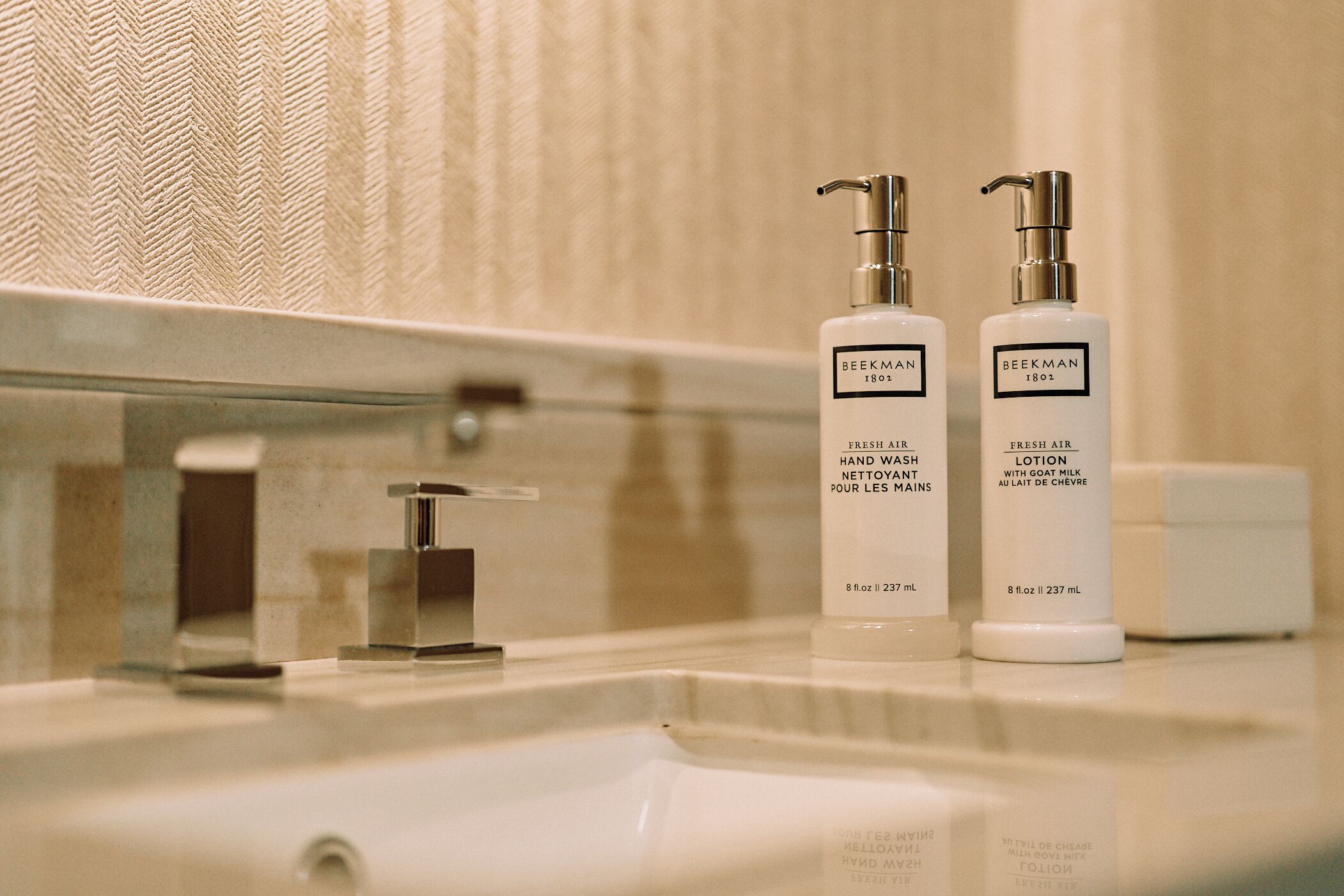 combined shower/bathtub, designer toiletries, hair dryer, bathrobes