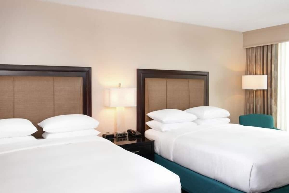 Premium bedding, pillow-top beds, minibar, in-room safe