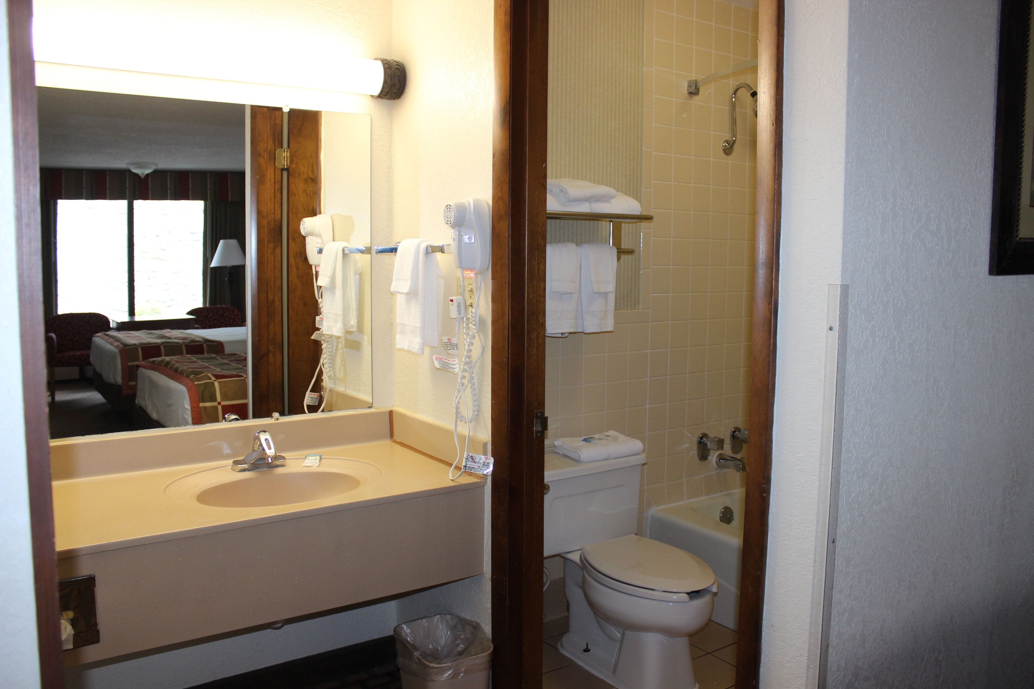 combined shower/bathtub, free toiletries, hair dryer, towels