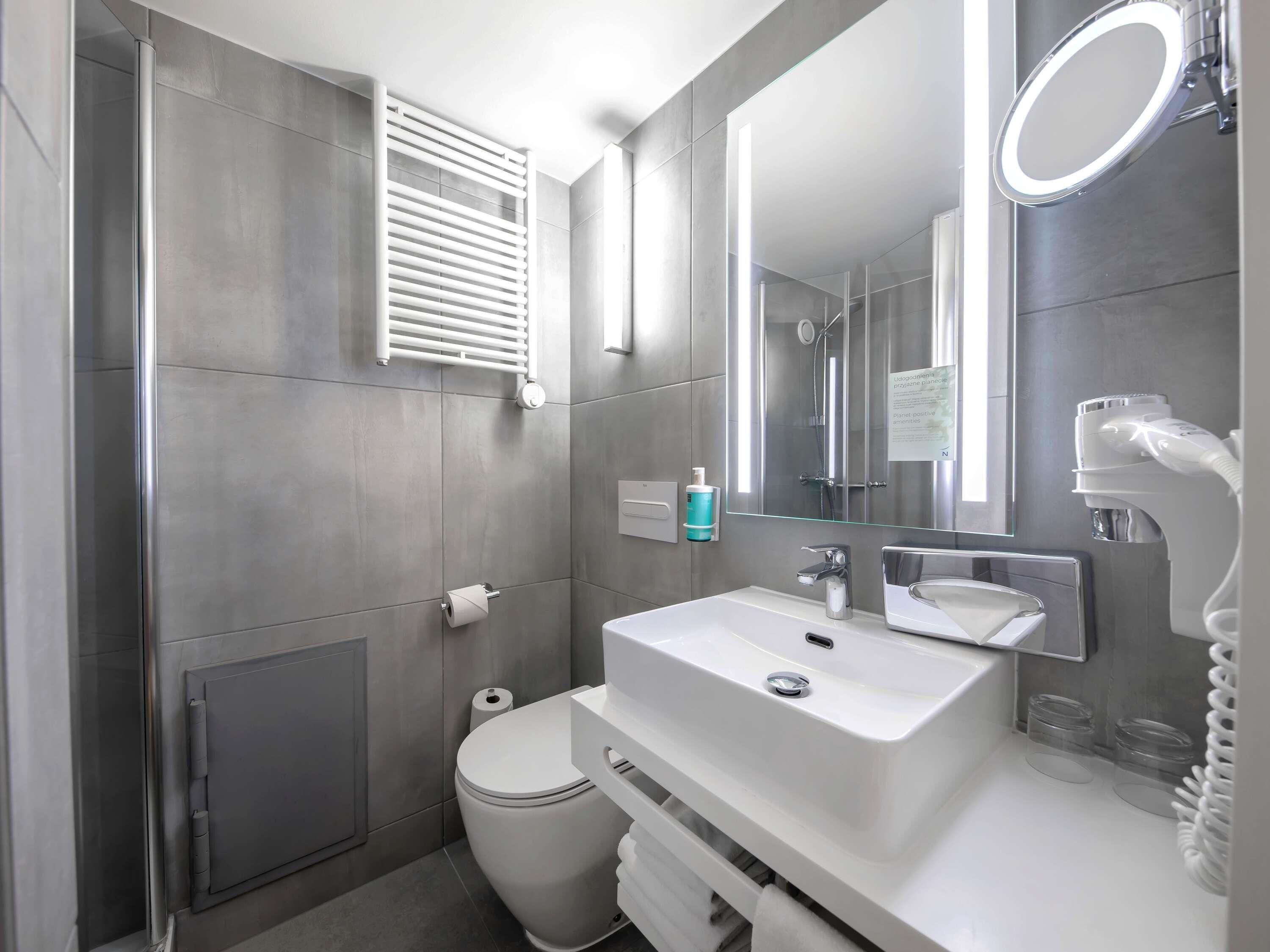 Eco-friendly toiletries, hair dryer, towels, shampoo