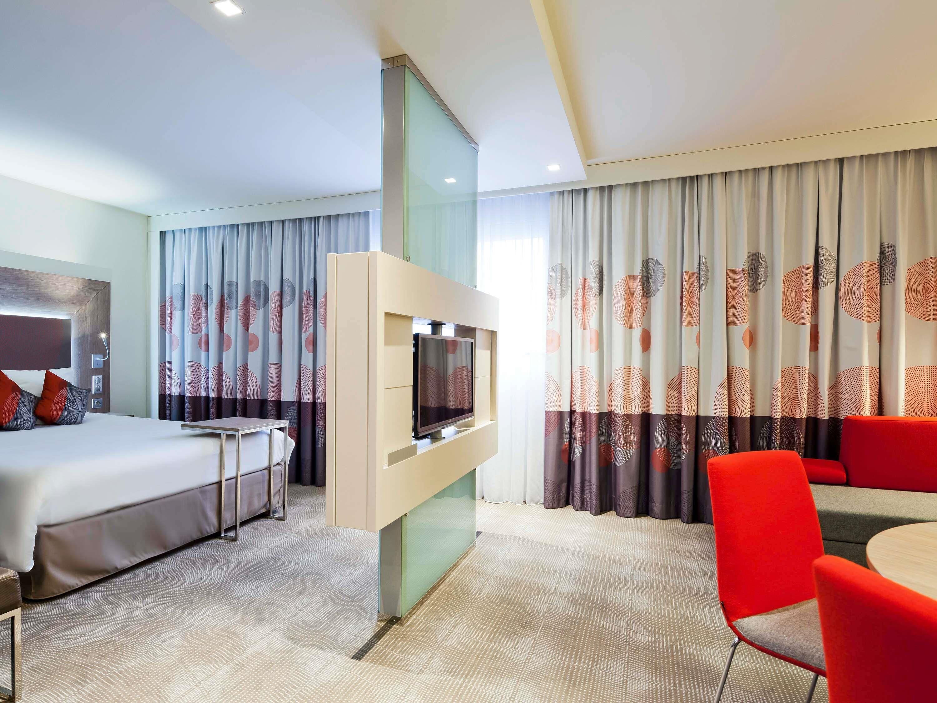 Junior Suite, 1 Queen Bed | 1 bedroom, in-room safe, desk, soundproofing