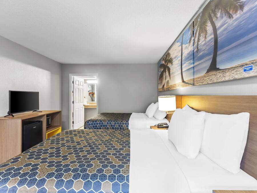 Room, 2 Double Beds, Accessible, Non Smoking | In-room safe, desk, iron/ironing board, free cribs/infant beds