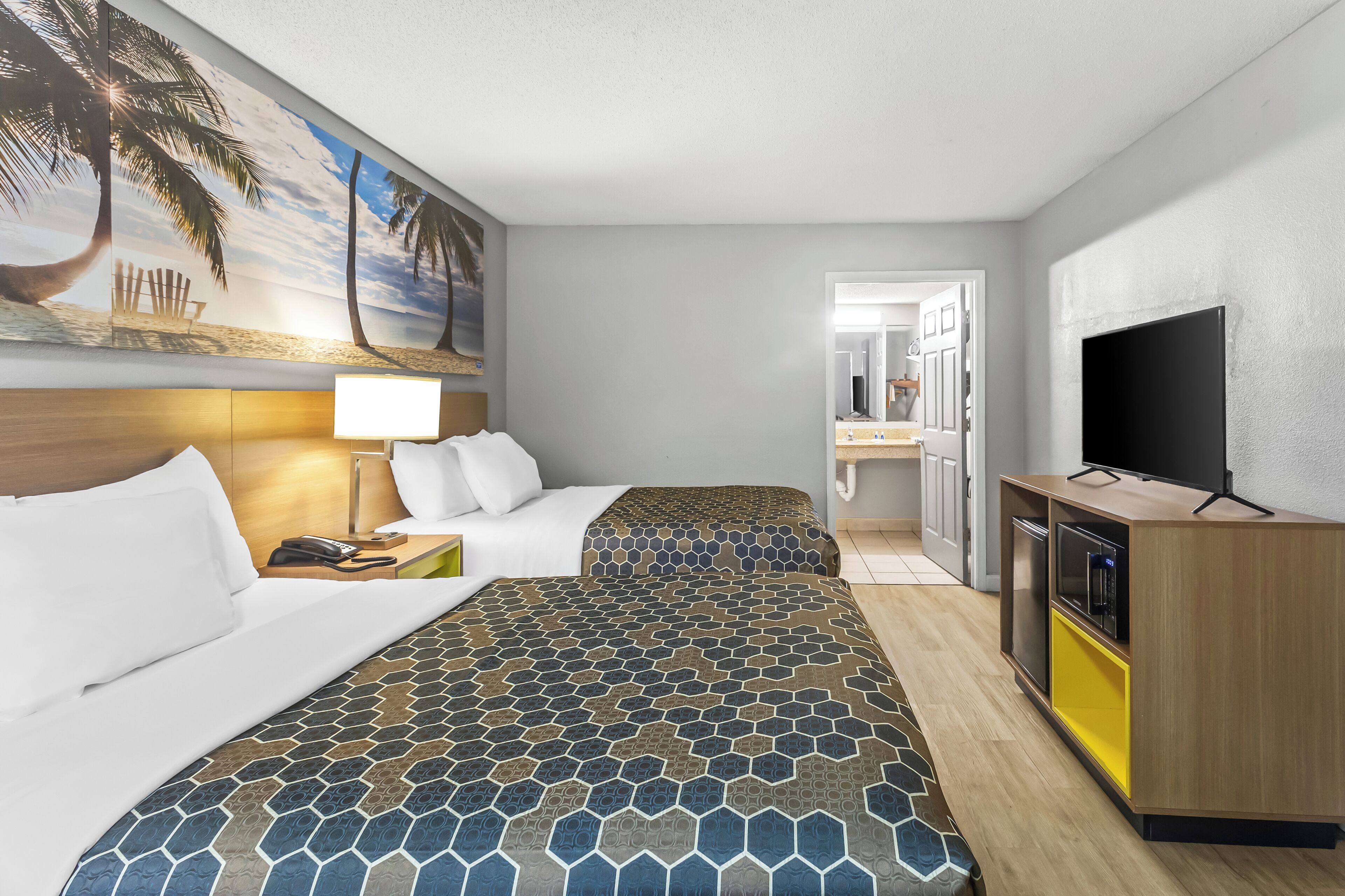 Standard Room, 2 Double Beds, Non Smoking | In-room safe, desk, iron/ironing board, free cribs/infant beds