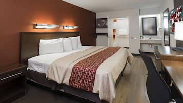 Deluxe Room, 1 King Bed (Smoke Free) | Desk, laptop workspace, blackout drapes, free cribs/infant beds
