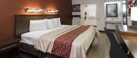 Deluxe Room, 1 King Bed (Smoke Free) | Desk, laptop workspace, blackout drapes, free cribs/infant beds