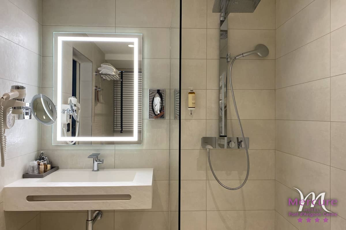 eco-friendly toiletries, hair dryer, towels