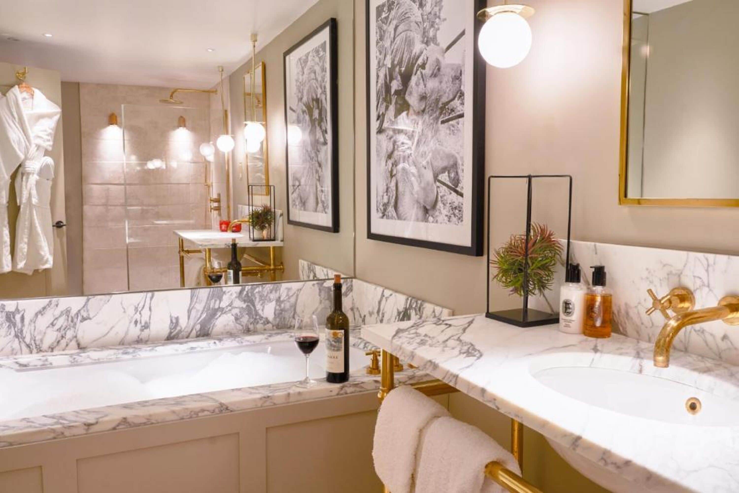 designer toiletries, hair dryer, bathrobes, slippers