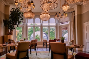 Breakfast, lunch, dinner served; Fusion cuisine, garden views