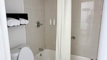 Combined shower/bathtub, free toiletries, hair dryer, towels