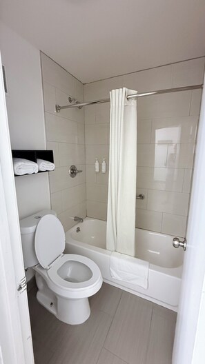 Combined shower/tub, free toiletries, hair dryer, towels - Super 8 by Wyndham Monticello AR (Monticello)