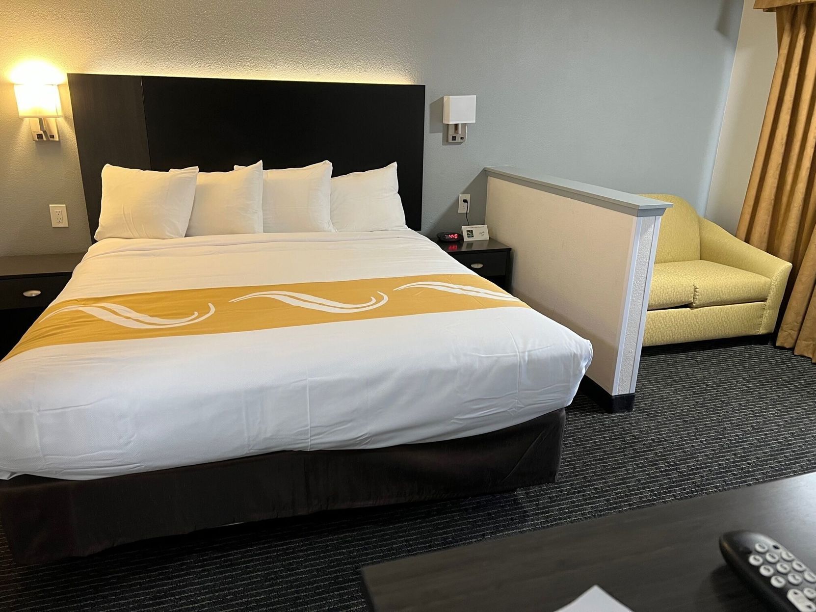 Premium bedding, down comforters, blackout drapes, iron/ironing board
