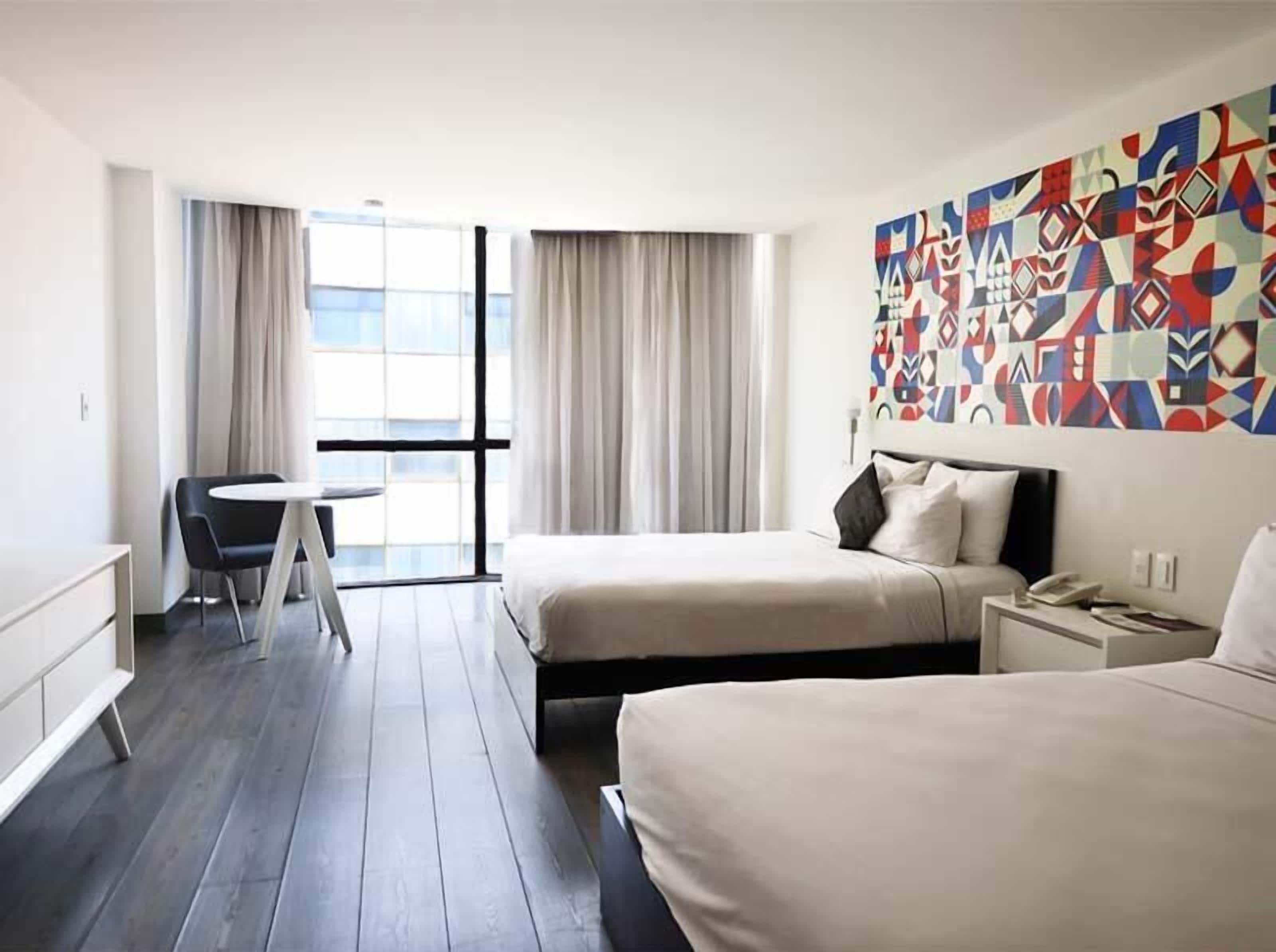 Premium bedding, in-room safe, laptop workspace, blackout curtains
