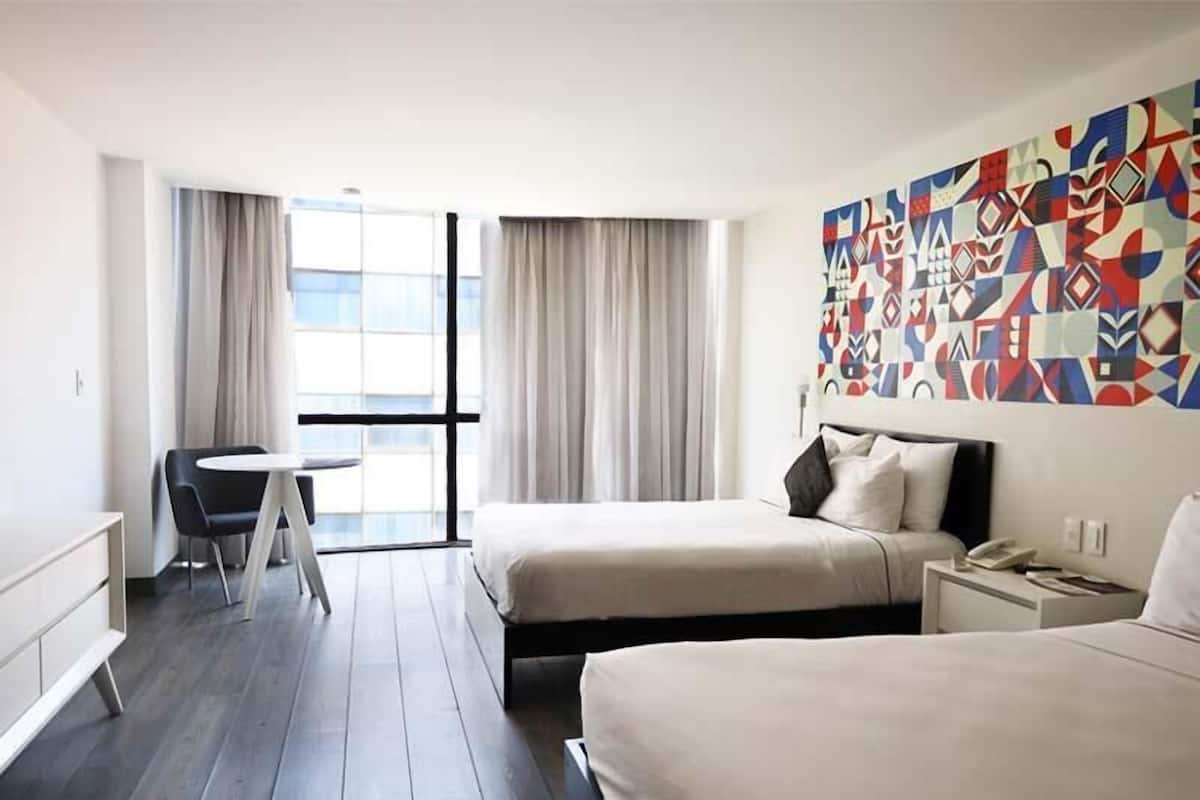 Premium bedding, in-room safe, laptop workspace, blackout curtains