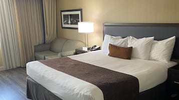 Room, 1 King Bed, Refrigerator | Down comforters, desk, laptop workspace, blackout drapes