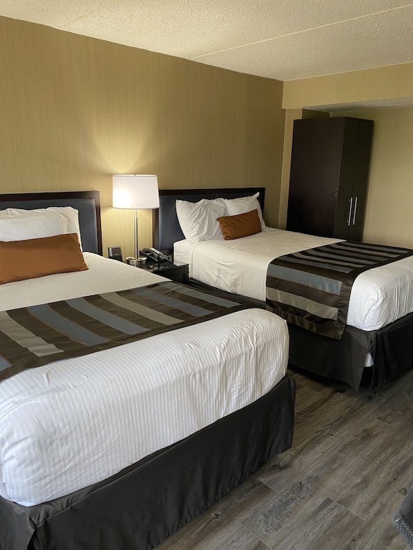 Room, 2 Double Beds, Refrigerator | Down comforters, desk, laptop workspace, blackout drapes