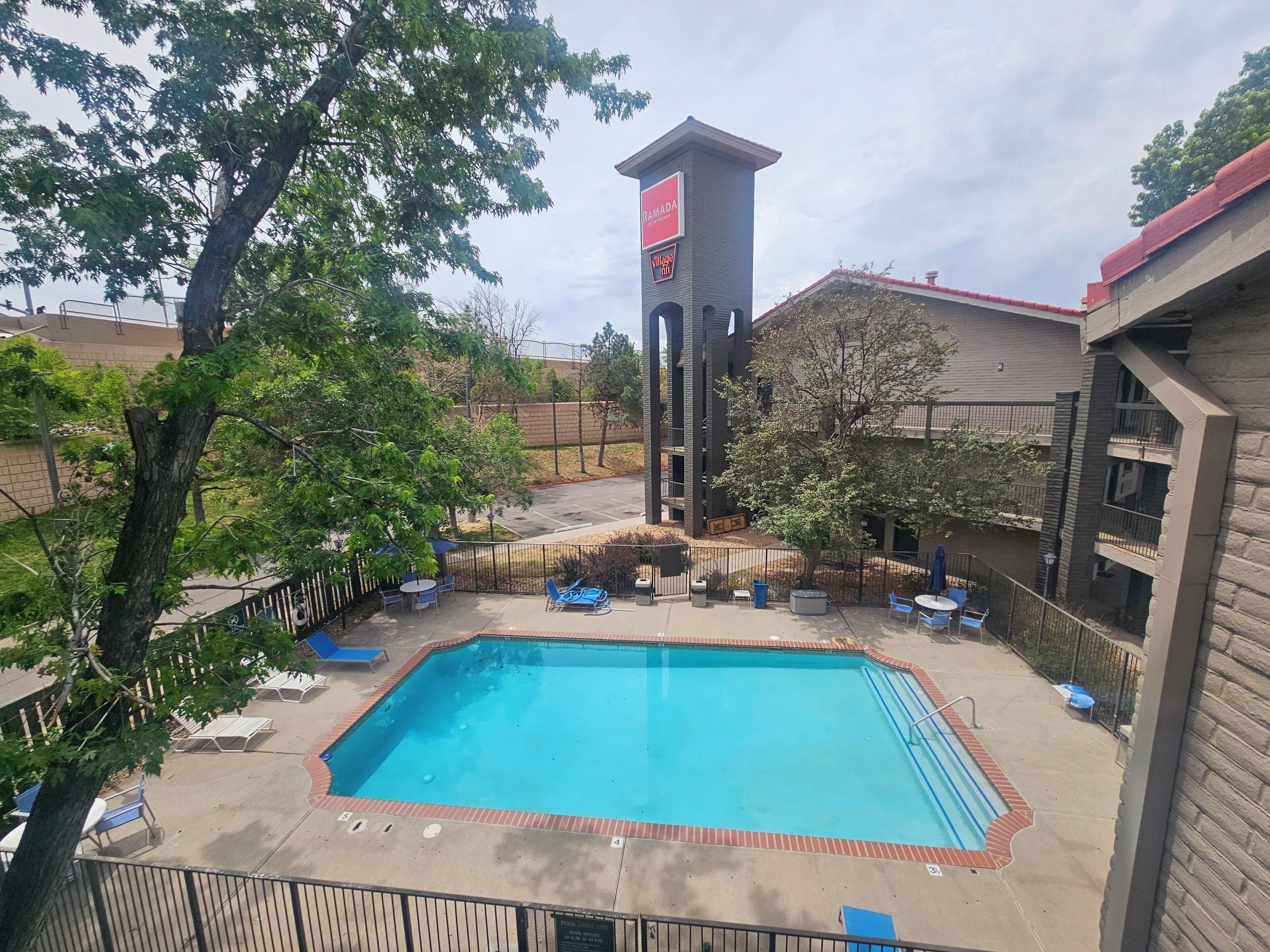 Seasonal outdoor pool, pool umbrellas, pool loungers