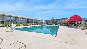 Outdoor pool, free pool cabanas, pool umbrellas