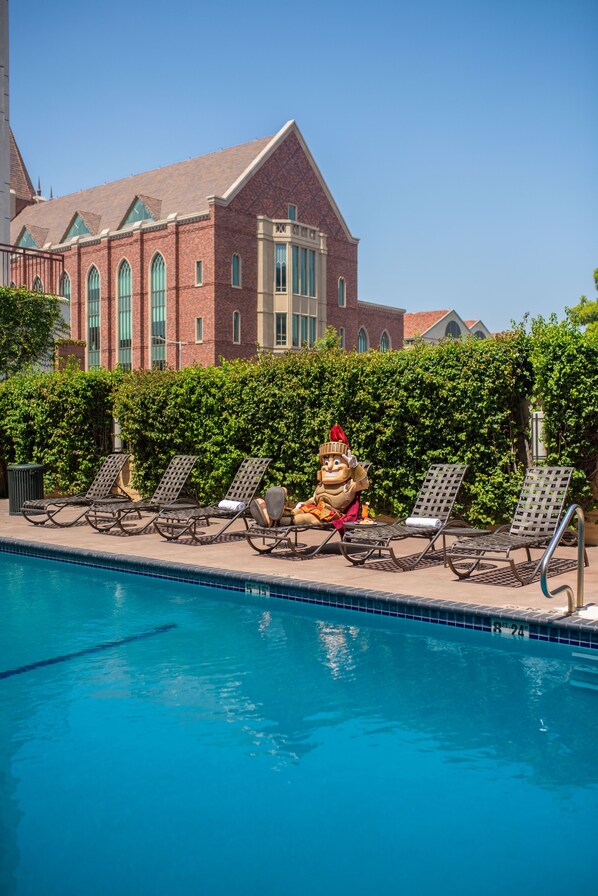 Outdoor pool, open 8:00 AM to 10:00 PM, pool umbrellas, sun loungers