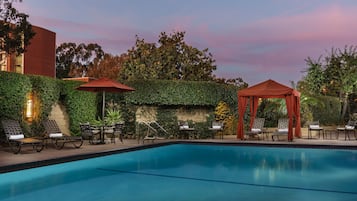 Outdoor pool, open 8:00 AM to 10:00 PM, pool umbrellas, sun loungers