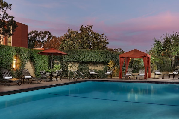 Outdoor pool, open 8:00 AM to 10:00 PM, pool umbrellas, pool loungers