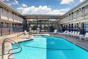 Outdoor pool, open 10:00 AM to 10:00 PM, pool umbrellas, sun loungers