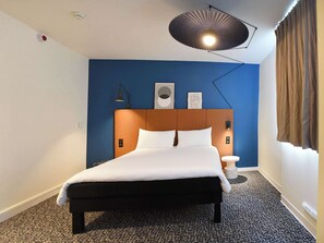 Premium bedding, desk, blackout curtains, soundproofing