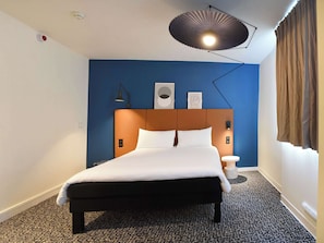 Premium bedding, desk, blackout curtains, soundproofing