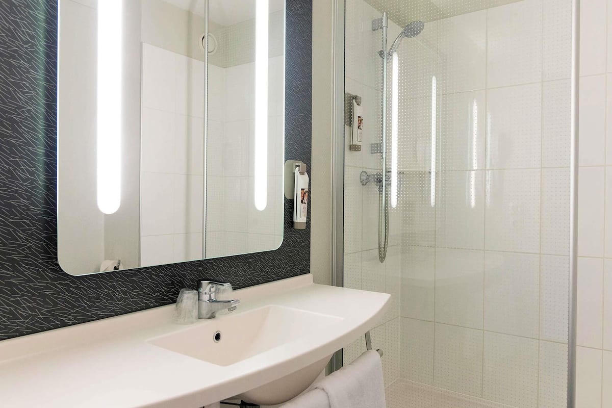 premium bedding, desk, blackout curtains, soundproofing