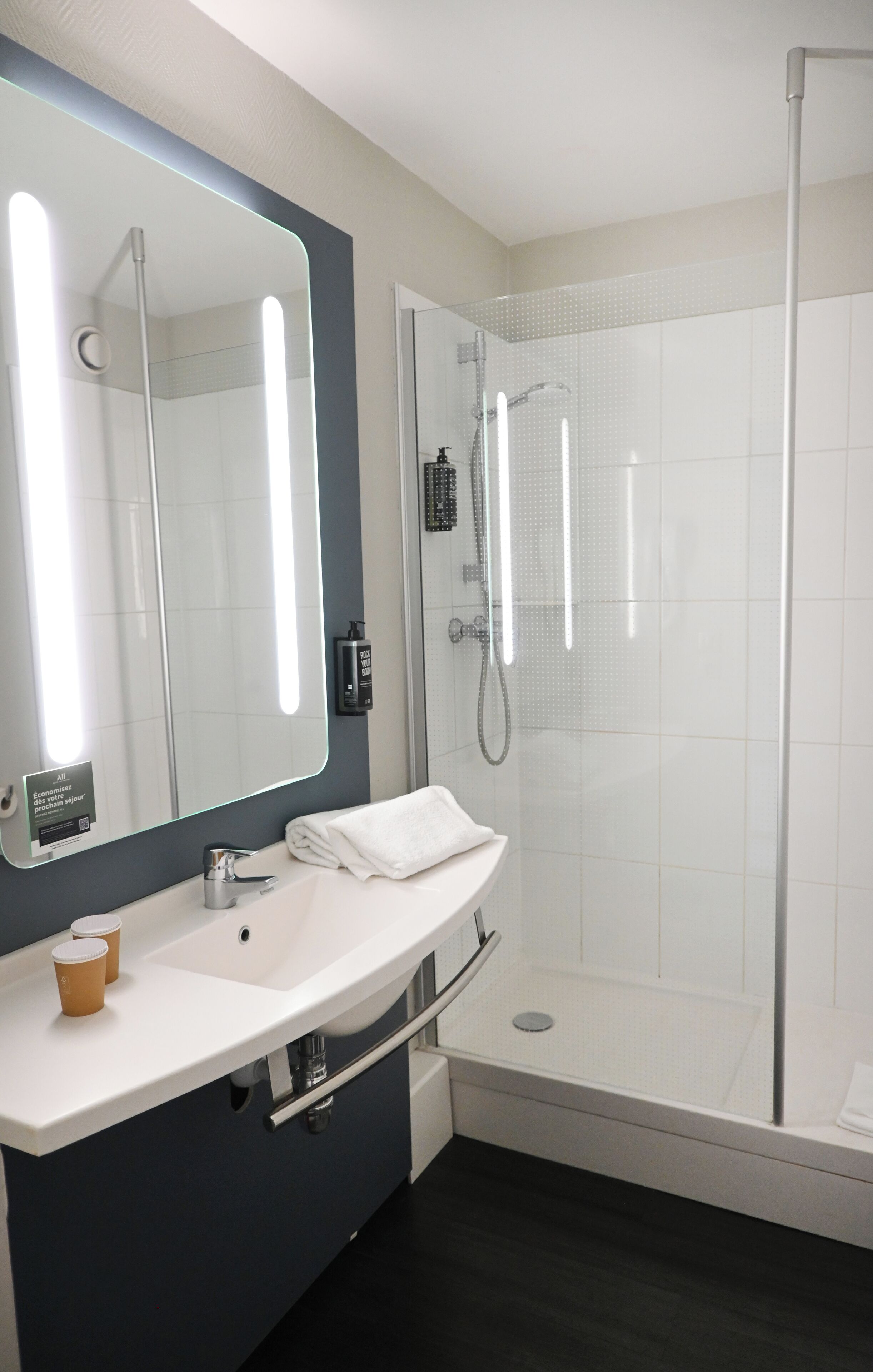 shower, eco-friendly toiletries, hair dryer, towels