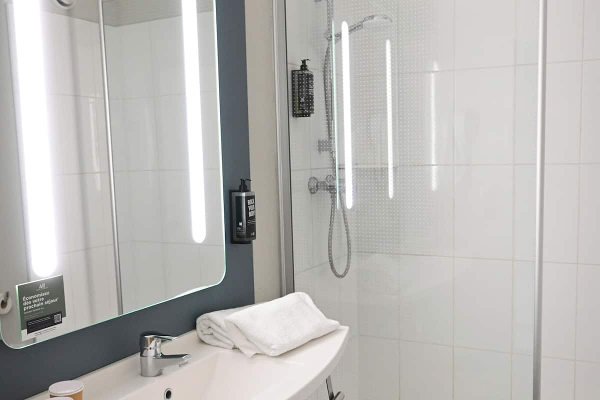 shower, eco-friendly toiletries, hair dryer, towels