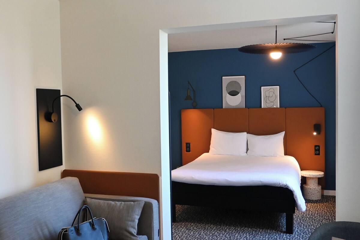 premium bedding, desk, blackout curtains, soundproofing