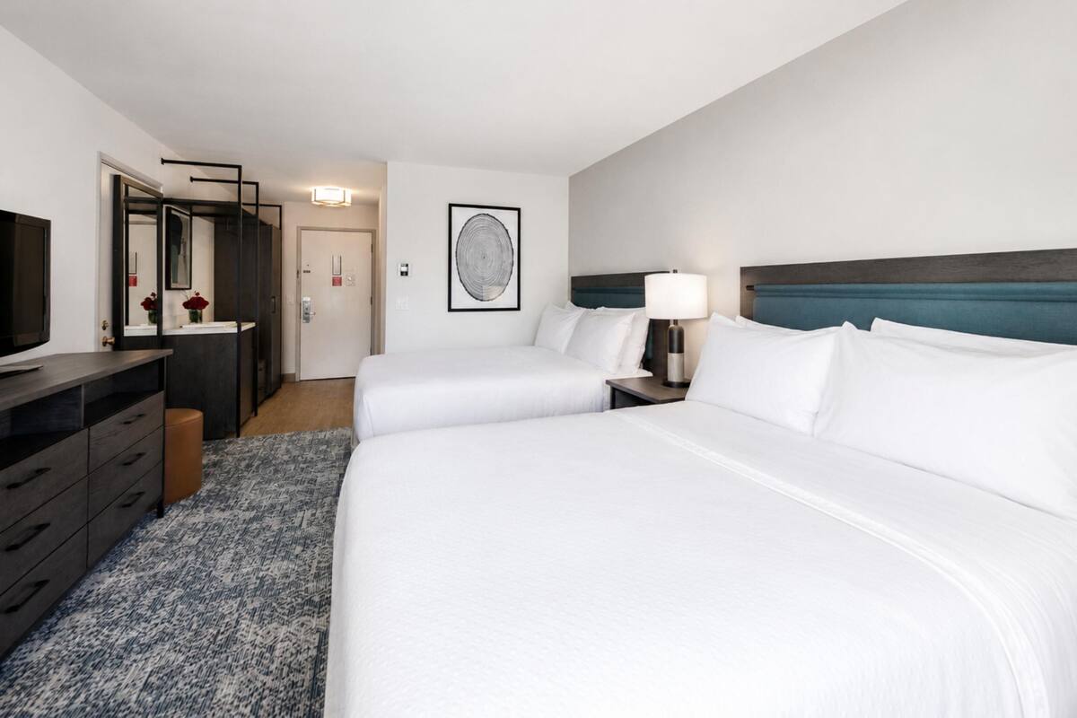 Family Room, Multiple Beds, Non Smoking | Pillow-top beds, in-room safe, desk, laptop workspace