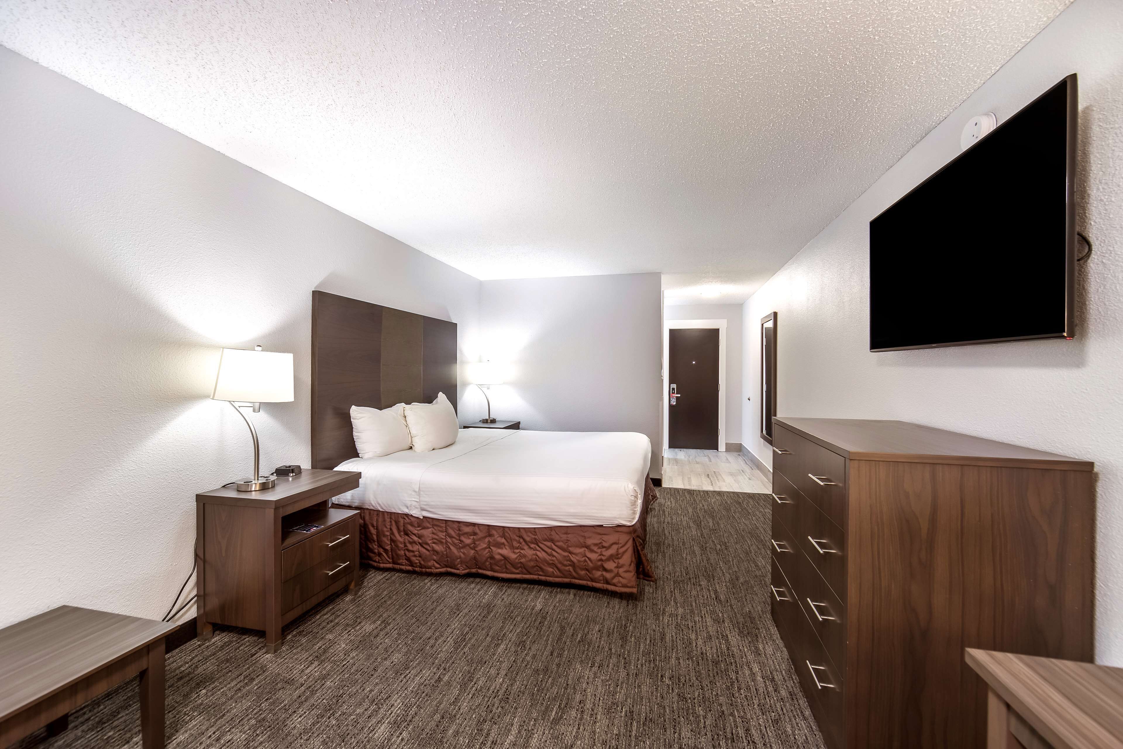 down duvets, pillow-top beds, desk, blackout curtains