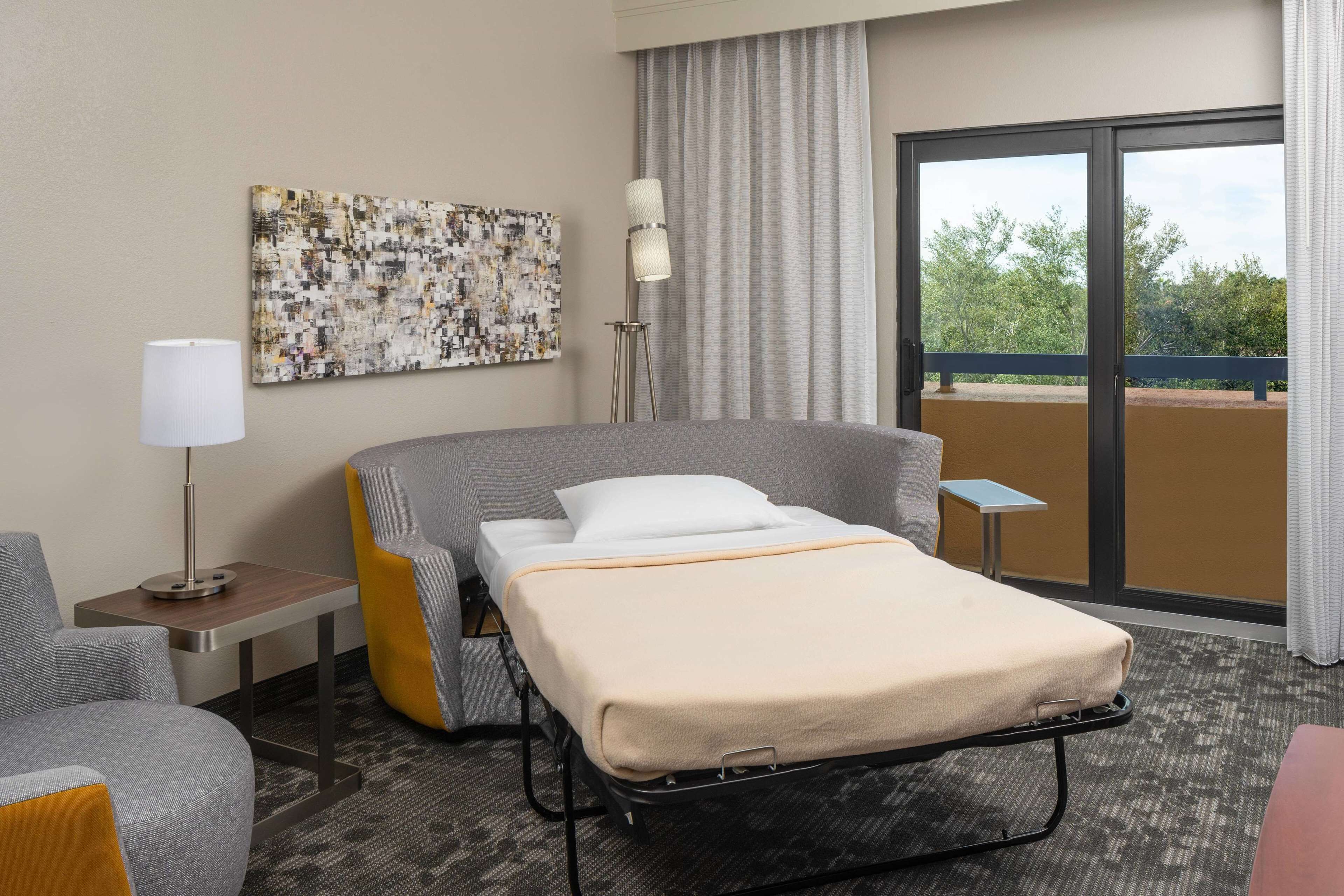 room, 1 king bed with sofa bed, balcony, pool view (preferred pool view) | room amenity