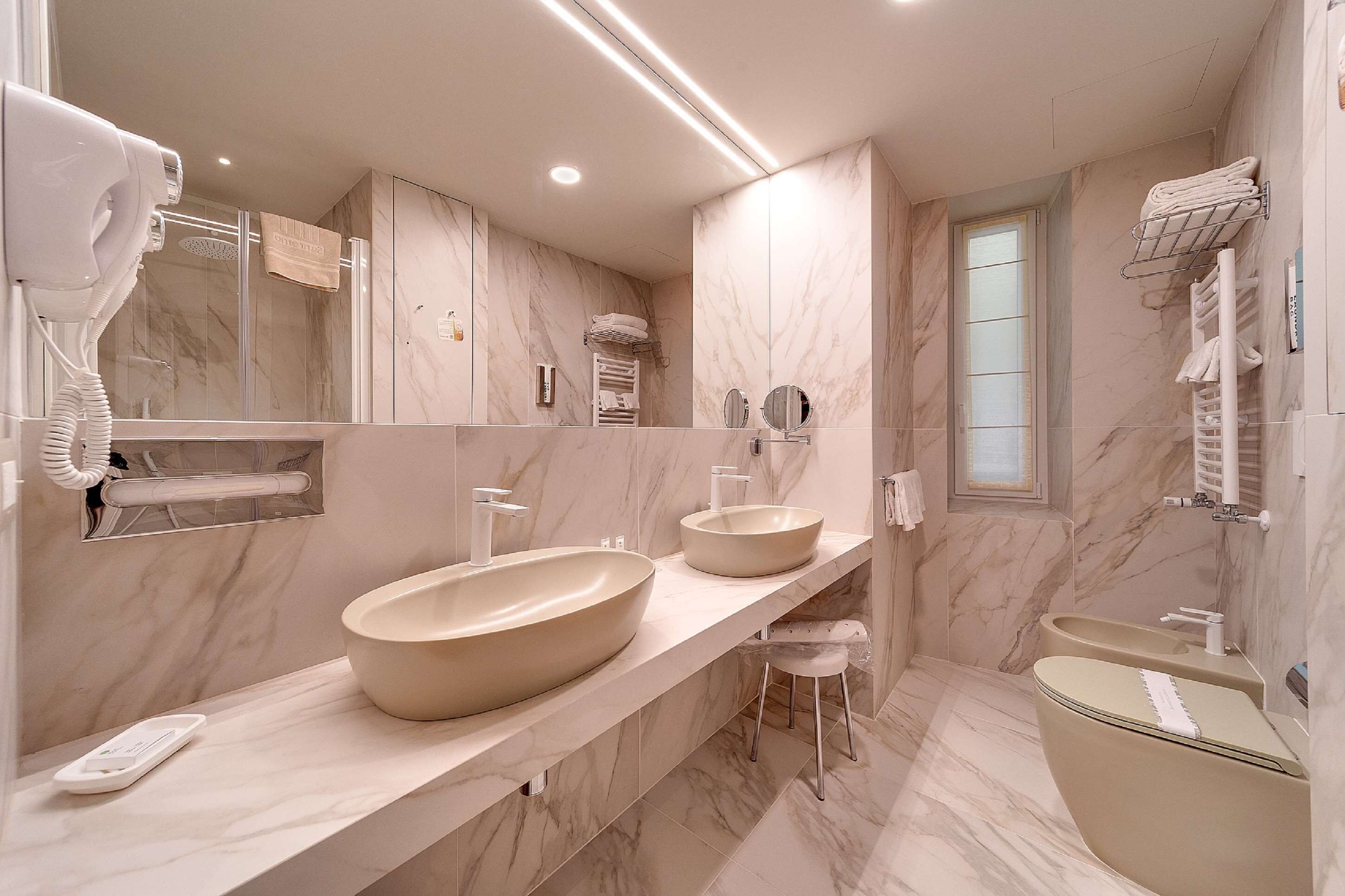 free toiletries, hair dryer, bidet, towels