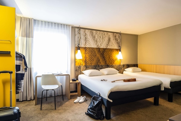 Desk, blackout curtains, free WiFi, bed sheets