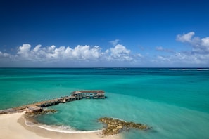 On the beach, white sand, sun-loungers, beach umbrellas - Sandals Royal Bahamian - ALL INCLUSIVE Couples Only (Nassau)