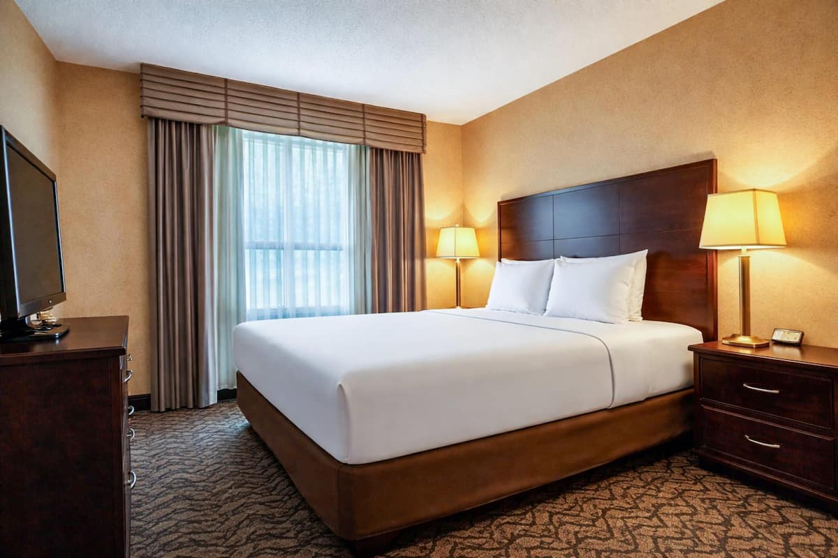 Premium bedding, pillow-top beds, desk, blackout curtains