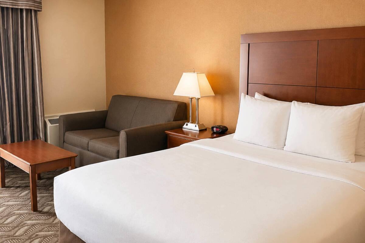 Premium bedding, pillow-top beds, desk, blackout curtains