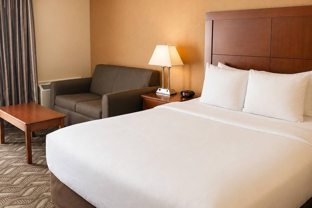 Premium bedding, pillowtop beds, desk, blackout drapes