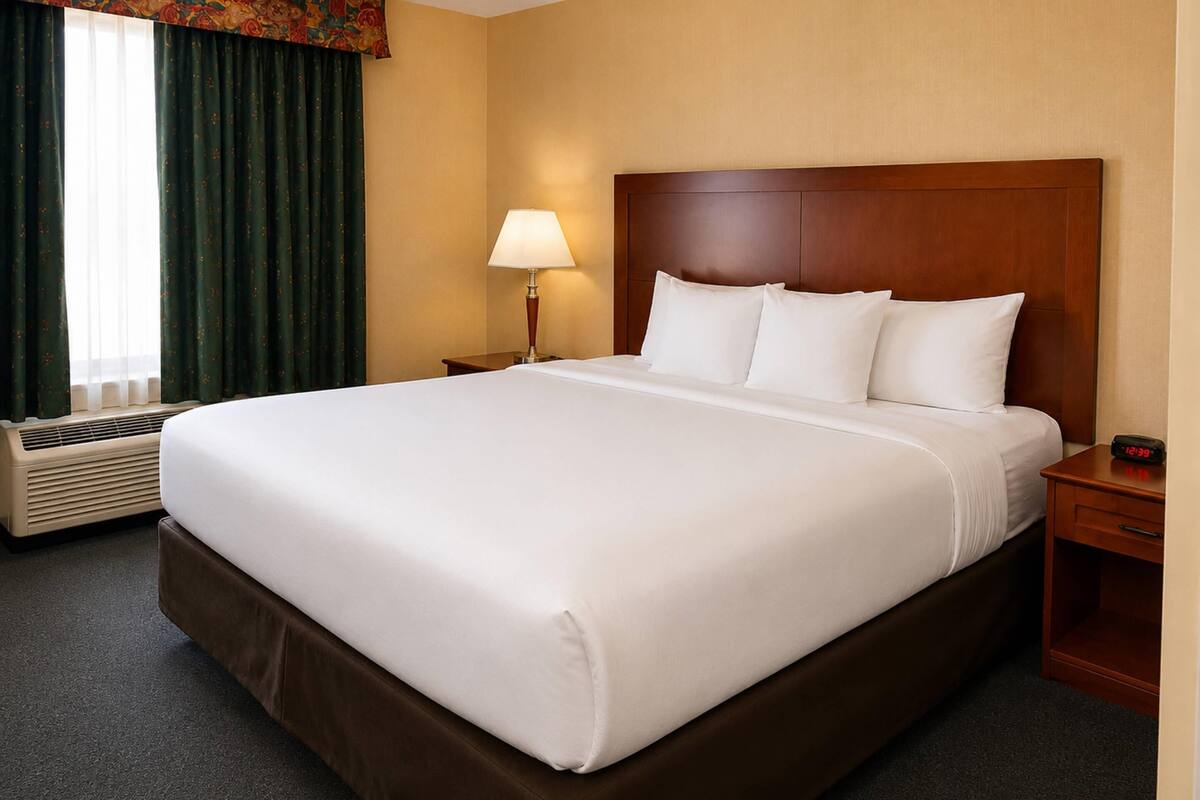 Premium bedding, pillowtop beds, desk, blackout drapes