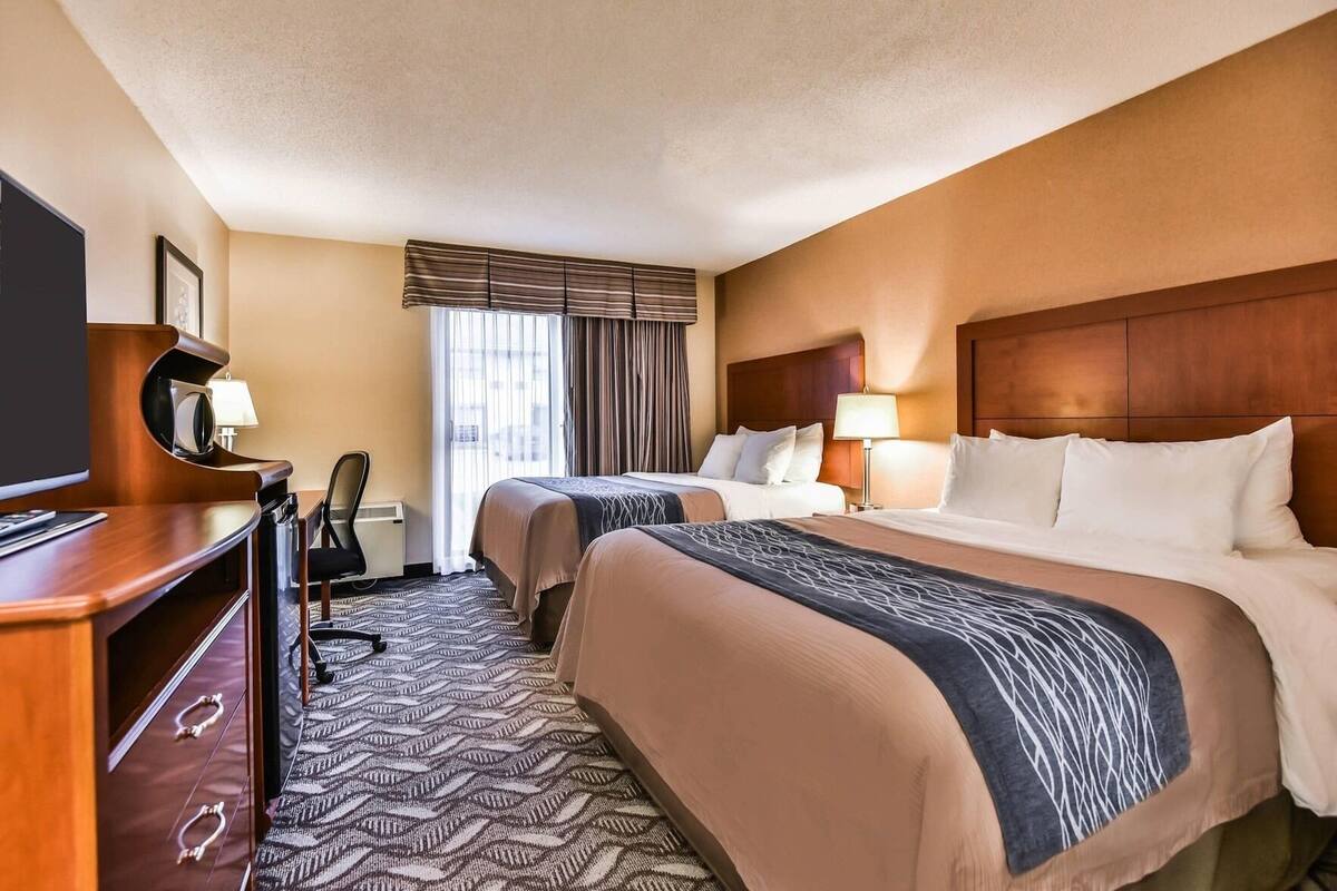 Premium bedding, pillow-top beds, desk, blackout curtains