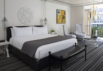 Hypo-allergenic bedding, minibar, in-room safe, blackout drapes at Avalon Hotel & Bungalows Palm Springs, a Member of Design Hotels