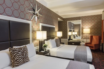 Premium bedding, in-room safe, individually decorated at Empire Hotel