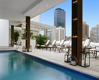 Seasonal outdoor pool, open 11:00 AM to 7:00 PM, sun loungers at Empire Hotel