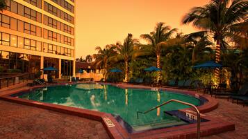 Outdoor pool, open 9 AM to 9 PM, pool umbrellas, sun loungers