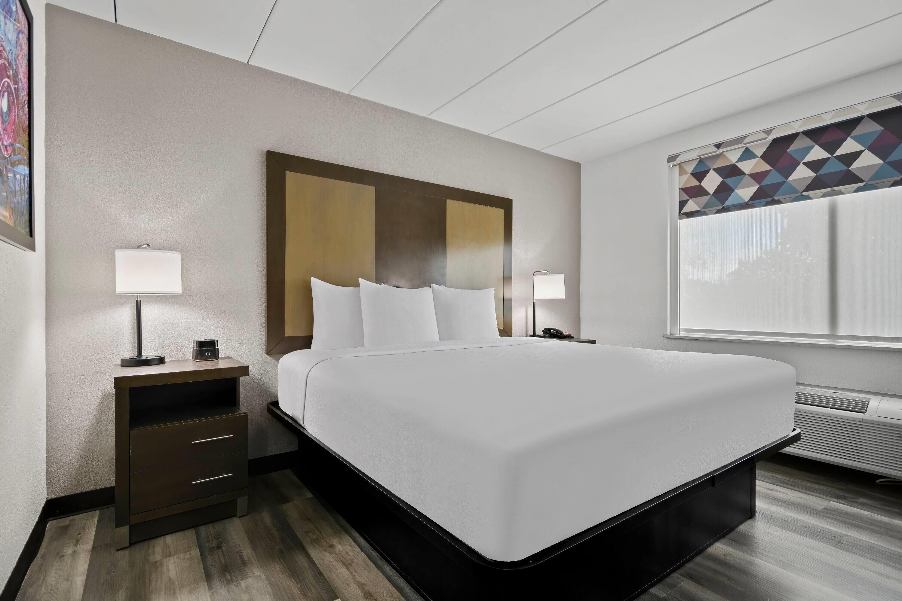 Premium bedding, pillowtop beds, desk, laptop workspace