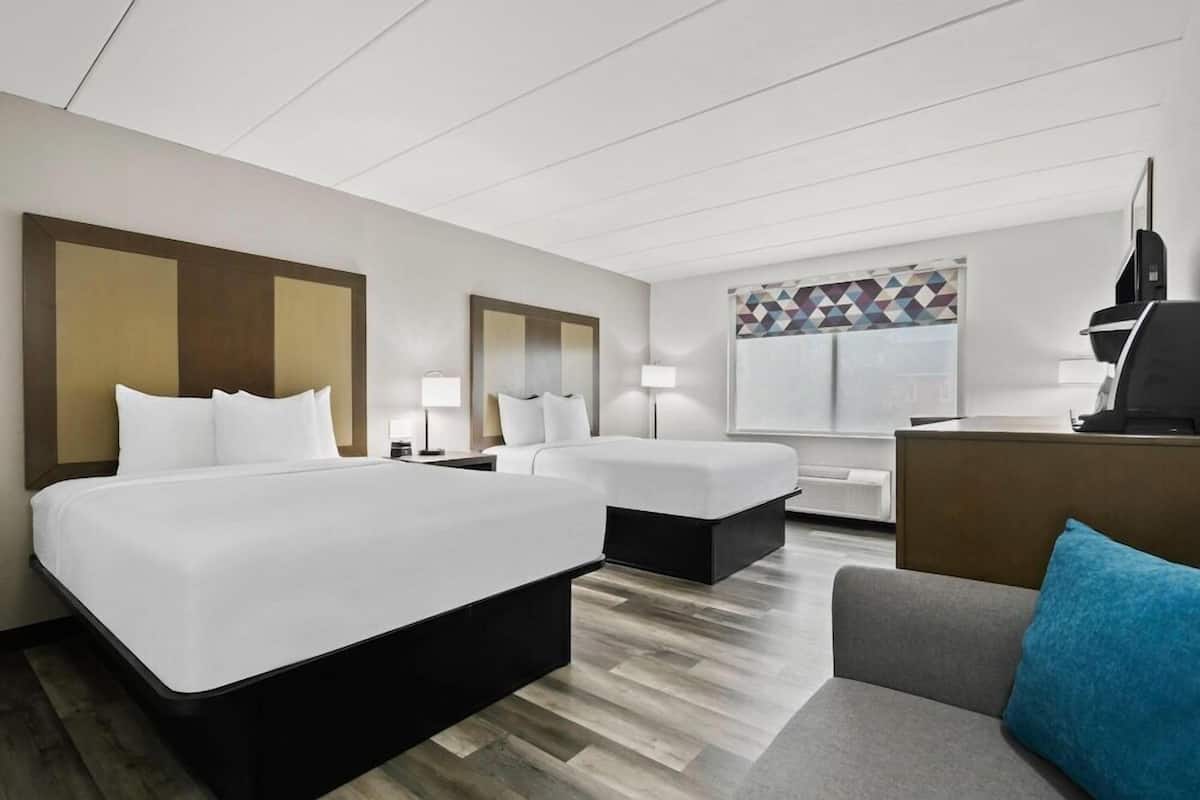 Premium bedding, pillowtop beds, desk, laptop workspace