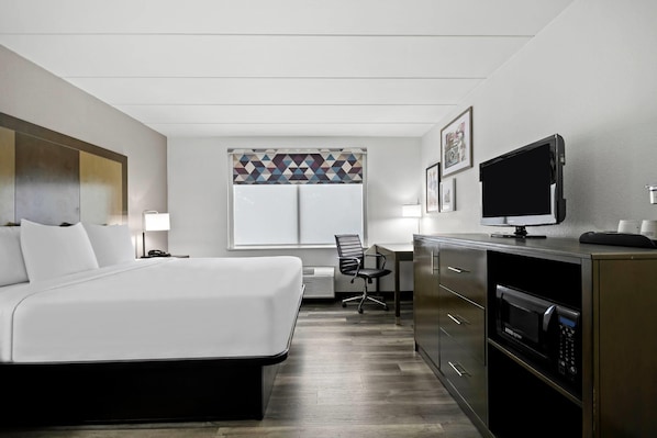 Premium bedding, pillow-top beds, desk, laptop workspace